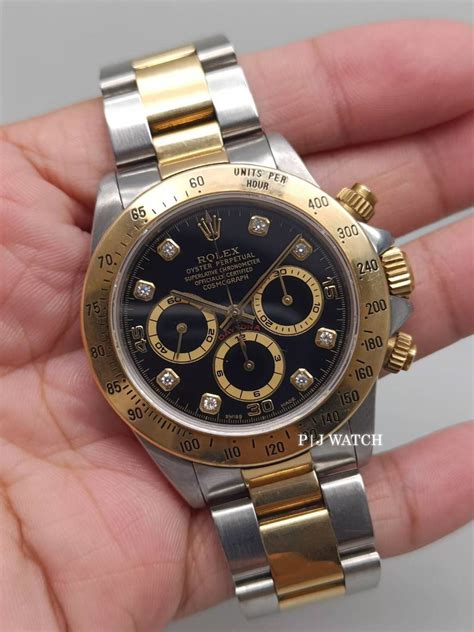 rolex daytona zenith yellow gold|More.